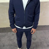 Marinblått tracksuit med zipjacka