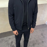 Svart tracksuit med zipjacka